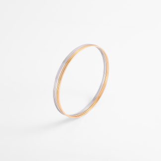 Pulsera bitono en baño de oro y rodio diseño minimalista 6.9 cm