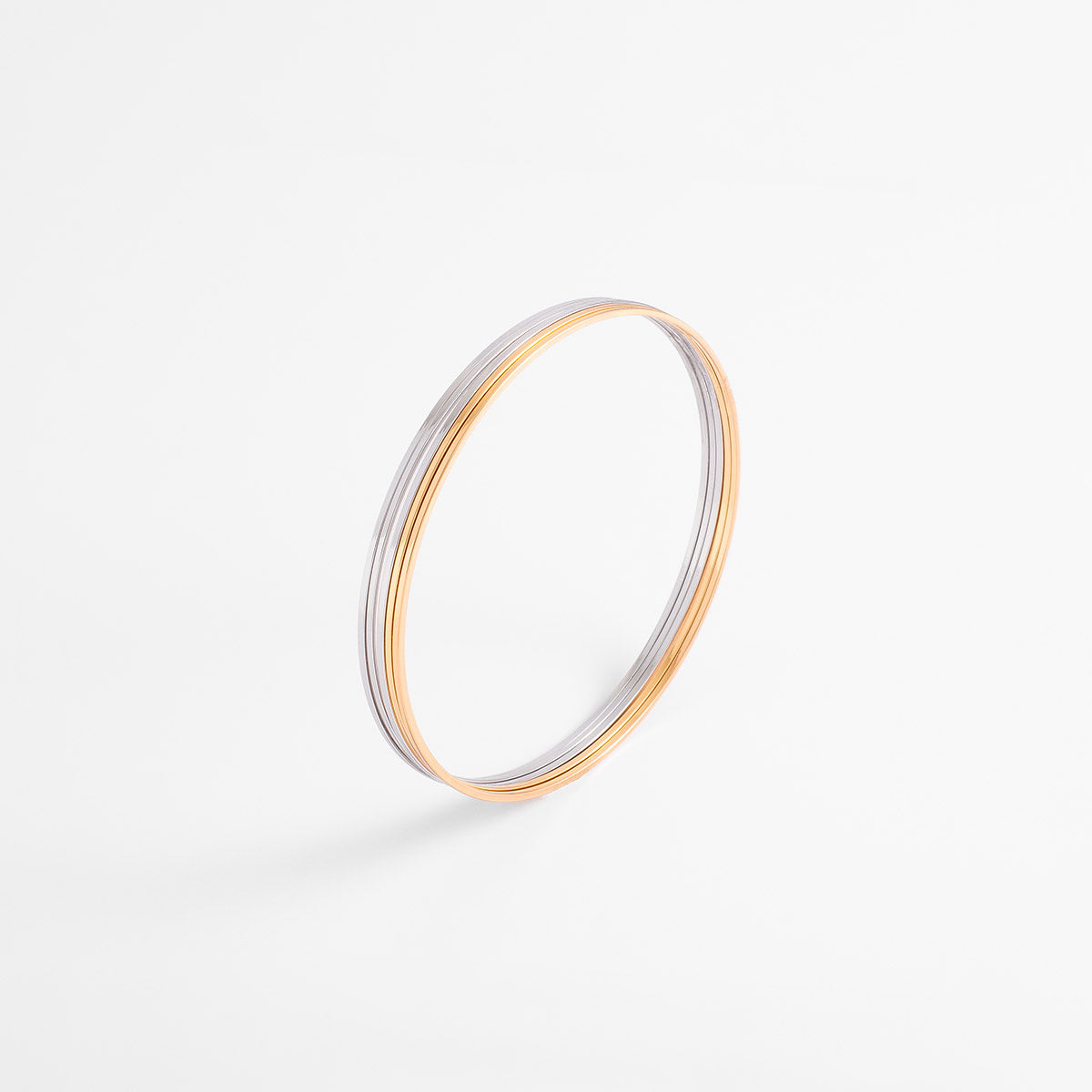 Pulsera bitono en baño de oro y rodio diseño minimalista 6.9 cm