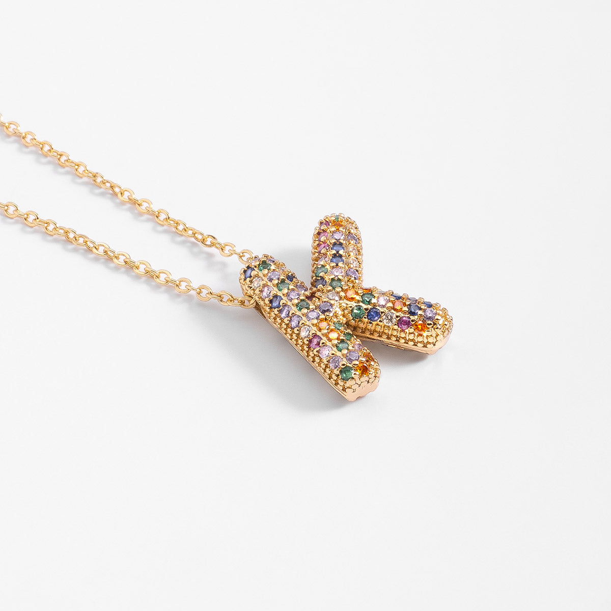 Collar en baño de oro letra K y piedras de color largo 42 cm + 10 cm ext